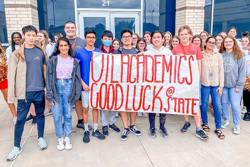 Members of the Cypress Woods High School UIL state academics team pose for a photo during a state send-off pep rally.
